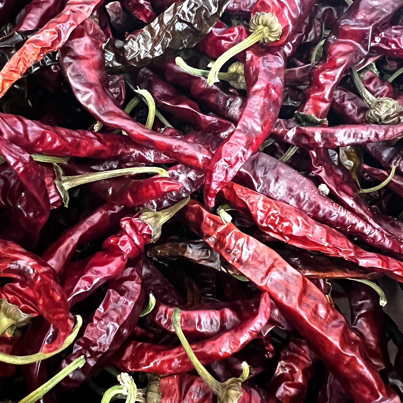 Dried cayenne peppers, close up